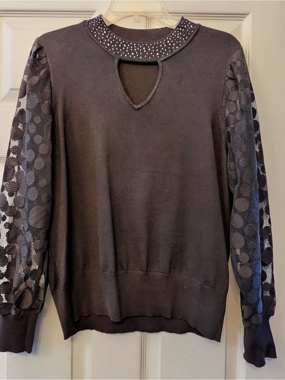 Women's Black Sweater with Embellished Neckline and Sheer Dot Sleeves